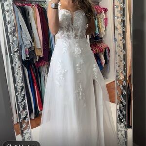 Elegant White Strapless Gown with Floral Details